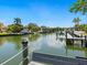Picturesque canal view from a private dock, offering serene waterfront living and convenient boat access at 5910 Gulf Of Mexico Dr, Longboat Key, FL 34228