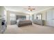 Main bedroom with tufted headboard and plenty of closet space at 6771 Wild Lake Ter, Bradenton, FL 34212