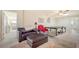 Versatile bonus room with seating, game table and an office area at 6771 Wild Lake Ter, Bradenton, FL 34212