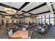 Community dining room with many tables and chairs at 6771 Wild Lake Ter, Bradenton, FL 34212