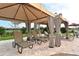 Relaxing poolside cabanas with lounge chairs at 6771 Wild Lake Ter, Bradenton, FL 34212