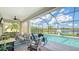 Relaxing pool area overlooking lake at 6771 Wild Lake Ter, Bradenton, FL 34212
