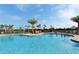 Stunning resort-style pool with palm trees and cabanas at 6771 Wild Lake Ter, Bradenton, FL 34212