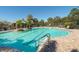 Resort-style pool with cabanas and lounge chairs at 7407 Sea Island Ln, Bradenton, FL 34201