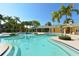 Large community pool with a water slide and surrounding amenities at 7407 Sea Island Ln, Bradenton, FL 34201