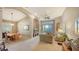 Spacious living room with lake view, featuring neutral colors and comfortable furnishings at 7407 Sea Island Ln, Bradenton, FL 34201