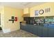 Community outdoor kitchen with grill, sink, and granite countertops at 7407 Sea Island Ln, Bradenton, FL 34201