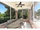 Relaxing screened patio with table and chairs, perfect for outdoor dining at 7407 Sea Island Ln, Bradenton, FL 34201