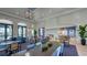 Community clubhouse features dining tables and comfortable seating at 8124 Anthirium Loop, Sarasota, FL 34240