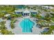 Lap pool with surrounding lounge chairs and landscaping at 8124 Anthirium Loop, Sarasota, FL 34240