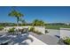 Outdoor patio furniture with view of grassy area at 8124 Anthirium Loop, Sarasota, FL 34240