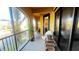 Spacious condo balcony overlooks water with seating at 99 Vivante Blvd # 99315, Punta Gorda, FL 33950