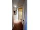 Hallway with carpet flooring and neutral wall colors at 99 Vivante Blvd # 99315, Punta Gorda, FL 33950