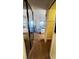Bedroom with mirrored closet doors and balcony access at 99 Vivante Blvd # 99315, Punta Gorda, FL 33950