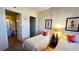 Charming bedroom with twin beds, nightstand and access to a bathroom at 99 Vivante Blvd # 99315, Punta Gorda, FL 33950