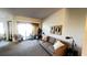 Living room with sofa and access to a private balcony at 99 Vivante Blvd # 99315, Punta Gorda, FL 33950