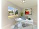 Bright home office features a large window and built-in workspace at 1010 Acadia Rd, Venice, FL 34293