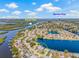Stunning aerial view of a waterfront home in Bradenton, Florida, showcasing its location on a tranquil canal at 1228 50Th E St, Bradenton, FL 34208
