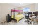 Bedroom featuring a bunk bed, a computer desk and a water view at 1228 50Th E St, Bradenton, FL 34208