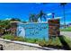 Entrance sign to Braden River Lakes community, featuring stone accents, lush landscaping, and a welcoming design at 1228 50Th E St, Bradenton, FL 34208