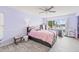 Charming bedroom with a queen bed and access to backyard at 1228 50Th E St, Bradenton, FL 34208