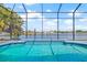 Screened pool with a lake view at 1228 50Th E St, Bradenton, FL 34208