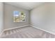 Bright bedroom with carpet and neutral walls at 12389 Cedar Pass Trl, Parrish, FL 34219