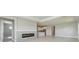 Open concept living room with kitchen and fireplace views at 12389 Cedar Pass Trl, Parrish, FL 34219