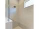 Spacious shower with neutral tile and glass enclosure at 12389 Cedar Pass Trl, Parrish, FL 34219