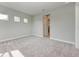 Spacious bedroom with grey carpet and neutral walls at 12389 Cedar Pass Trl, Parrish, FL 34219