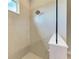 Large walk-in shower with neutral tile and glass enclosure at 12389 Cedar Pass Trl, Parrish, FL 34219