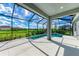 Screened-in pool and patio area at 12389 Cedar Pass Trl, Parrish, FL 34219