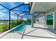 Spacious screened pool and patio area, perfect for entertaining and relaxation at 12389 Cedar Pass Trl, Parrish, FL 34219