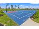 Outdoor community basketball court with painted lines and hoop at 15511 Sunny Day Dr, Lakewood Ranch, FL 34211
