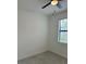 Bright bedroom with ceiling fan and window blinds at 15511 Sunny Day Dr, Lakewood Ranch, FL 34211