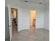 Bedroom with access to kitchen and bathroom at 15511 Sunny Day Dr, Lakewood Ranch, FL 34211