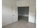 Open bonus room with tile flooring and access to other rooms at 15511 Sunny Day Dr, Lakewood Ranch, FL 34211