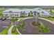 Elegant community center with ample parking and landscaping at 15511 Sunny Day Dr, Lakewood Ranch, FL 34211