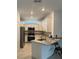 Modern kitchen with granite countertops and island at 15511 Sunny Day Dr, Lakewood Ranch, FL 34211