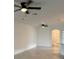 Bright living room with tile flooring and ceiling fans at 15511 Sunny Day Dr, Lakewood Ranch, FL 34211
