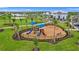 Community playground with colorful play equipment at 15511 Sunny Day Dr, Lakewood Ranch, FL 34211