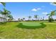 Enjoy resort-style living with this community putting green at 15511 Sunny Day Dr, Lakewood Ranch, FL 34211