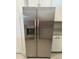 Stainless steel refrigerator with an ice maker at 15511 Sunny Day Dr, Lakewood Ranch, FL 34211