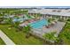 Large community pool with multiple areas for swimming and lounging at 15511 Sunny Day Dr, Lakewood Ranch, FL 34211