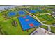 Aerial view of tennis and basketball courts at 15511 Sunny Day Dr, Lakewood Ranch, FL 34211