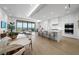 Modern kitchen with white cabinets and marble countertops at 1591 Gulf Of Mexico Dr # 515, Longboat Key, FL 34228