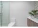 Clean bathroom with walk in shower and floating vanity at 1591 Gulf Of Mexico Dr # 515, Longboat Key, FL 34228