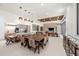 Community room with dining table and kitchen area at 1591 Gulf Of Mexico Dr # 515, Longboat Key, FL 34228