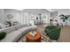Open concept living area with modern furniture and kitchen at 1591 Gulf Of Mexico Dr # 515, Longboat Key, FL 34228