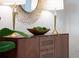 Stylish entryway showcasing a decorative mirror and lamps at 1591 Gulf Of Mexico Dr # 515, Longboat Key, FL 34228